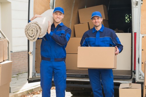 Professional movers handling household items