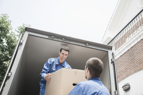 Removalists loading belongings into a moving truck